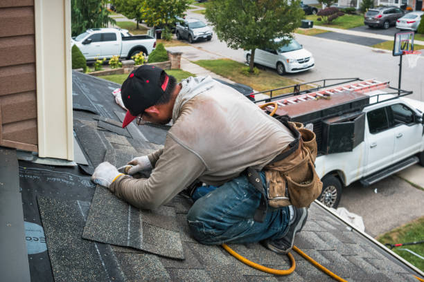 Professional Roof Replacement technician working in Prairie Lea, TX